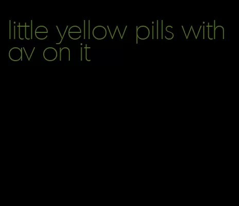 little yellow pills with av on it